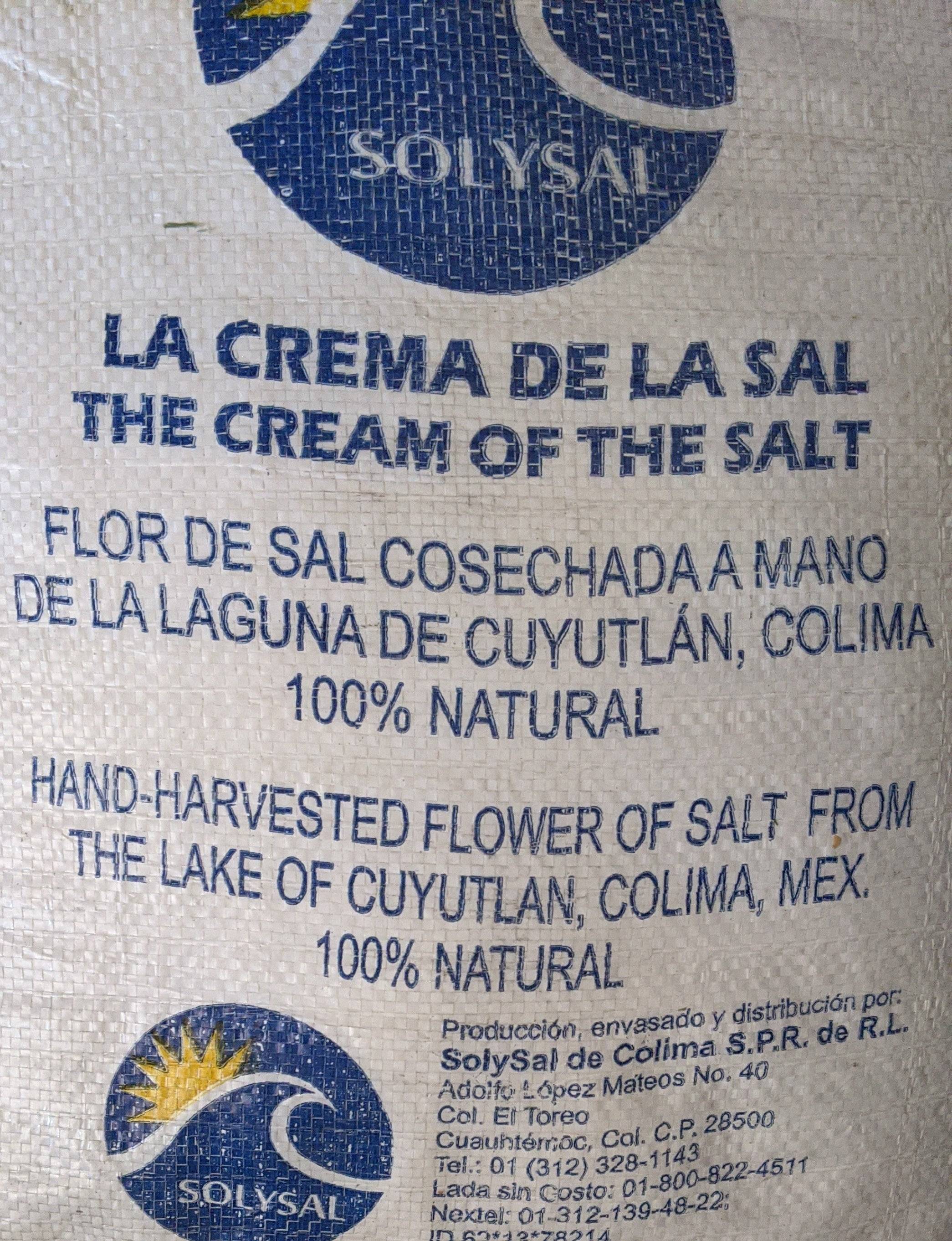 Fleur De Sel salt bag labeled 'La Crema de la Sal' from Cuyutlán, Colima, Mexico, featuring 100% natural hand-harvested sea salt.